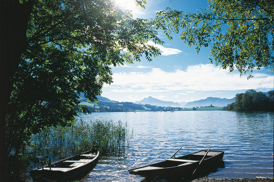 Ruderboot fahren im Urlaub in Österreich Ruderboote am Mondsee in Oberösterreich